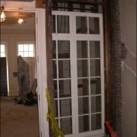 DISCOVERY: Original French pocket doors discovered hidden away  from an earlier renovation - now preserved in wall.