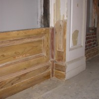 RESTORATION DETAILS: Restoration of original paneling and window sash on and off site.
