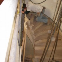 RESTORATION AND REPLICATION: Installing the new stairs – replicas of the originals.
