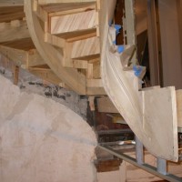 RESTORATION AND REPLICATION: Installing the new stairs – replicas of the originals.