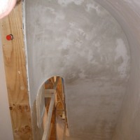 RESTORATION: New plaster accentuates the complex form of the central stairs.