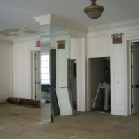 EXISTING CONDITIONS 2001: Drawing Room with mirror wrapped structural column (to be removed).